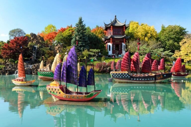 View of the tranquil Chinese Garden at the Montreal Botanical Garden, featuring traditional pavilions and lush plantings.