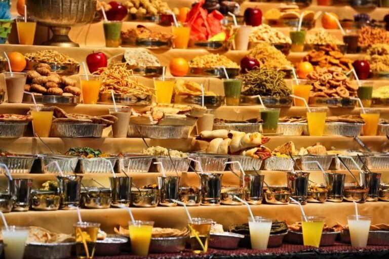 A group of people enjoying a food tour in Vancouver, sampling various dishes and drinks.