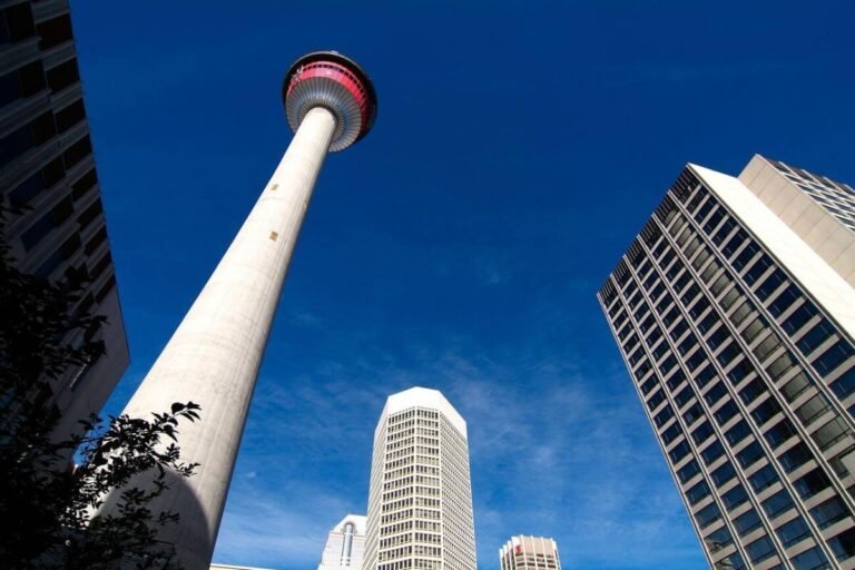 Calgary Tower with observation deck offering 360-degree views and a glass-floor walkway